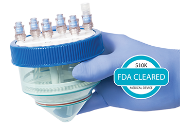 MiniTC being held by a gloved hand in a page comparing microfat to PRP and BMAC.